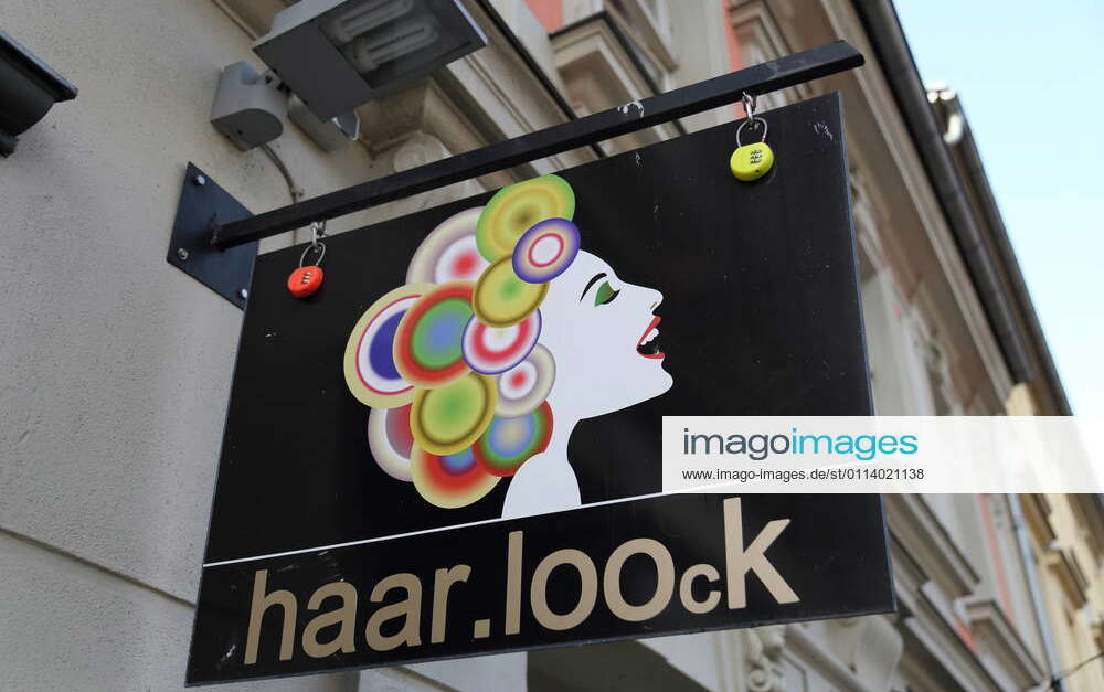 Sign at the closed hair salon haar loock during the lockdown to contain