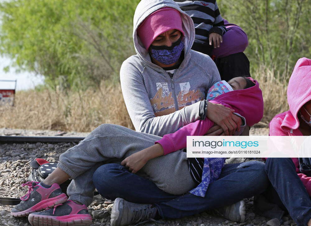 March 26, 2021, La Joya, Texas, USA A migrant mother and child are