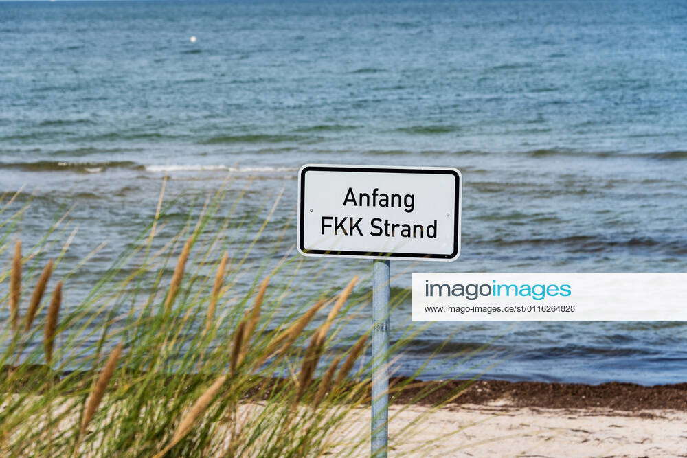 Sign at the beginning of the nudist beach marks the beginning of the ...