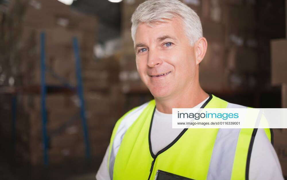 Close up of worker in warehouse Close up portrait of manual worker in ...