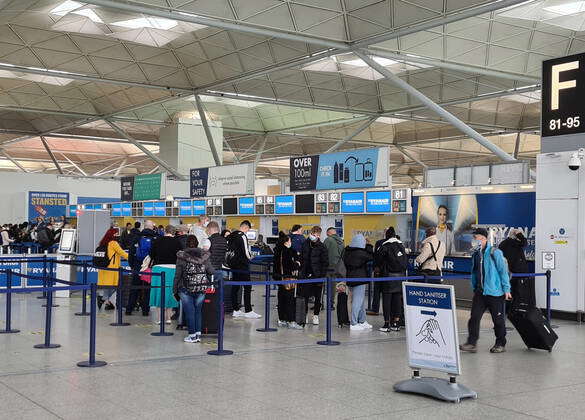 Holidaymakers at Stansted Airport on the first day of the easing of ...