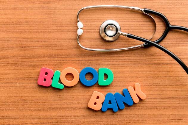 Blood bank colorful word on the wooden background with stethoscope ...