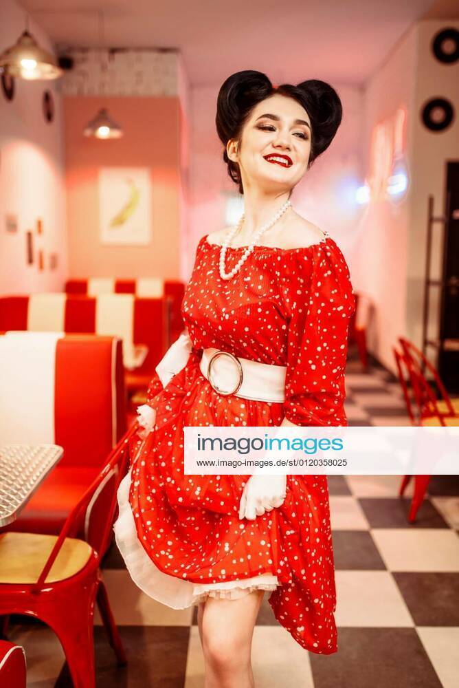 Pinup woman in retro cafe with checkerboard floor model released ...