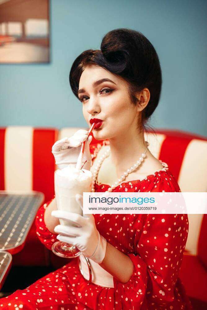 Sexy Pin Up Girl Drinks Milkshake Through A Straw Model Released Symbolfoto 06022020 160155 C