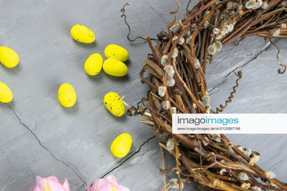 Preparing for the packaging of gifts, on the table laid out red and white wrapping paper, threads