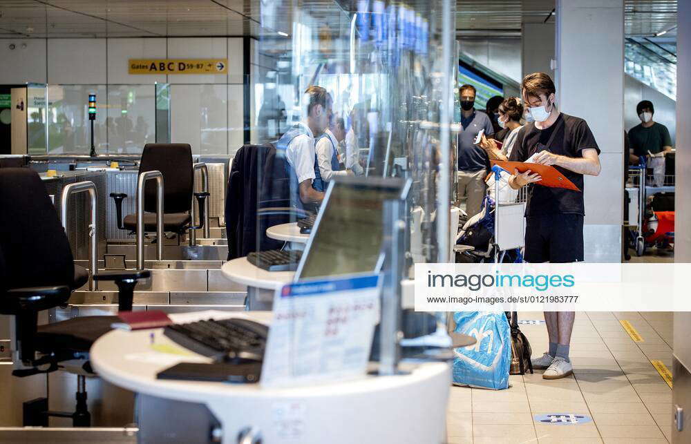 SCHIPHOL KLM check in desks at Schiphol Airport Now that the corona