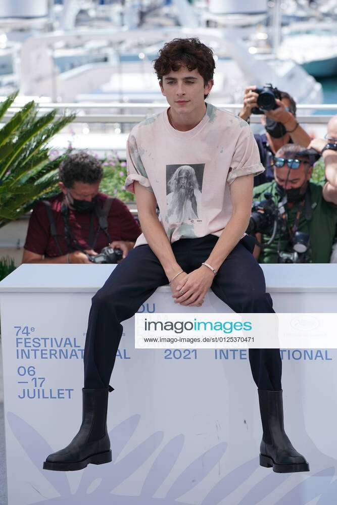 Timothee Chalamet In Baseball Hat & Sneakers At Cannes