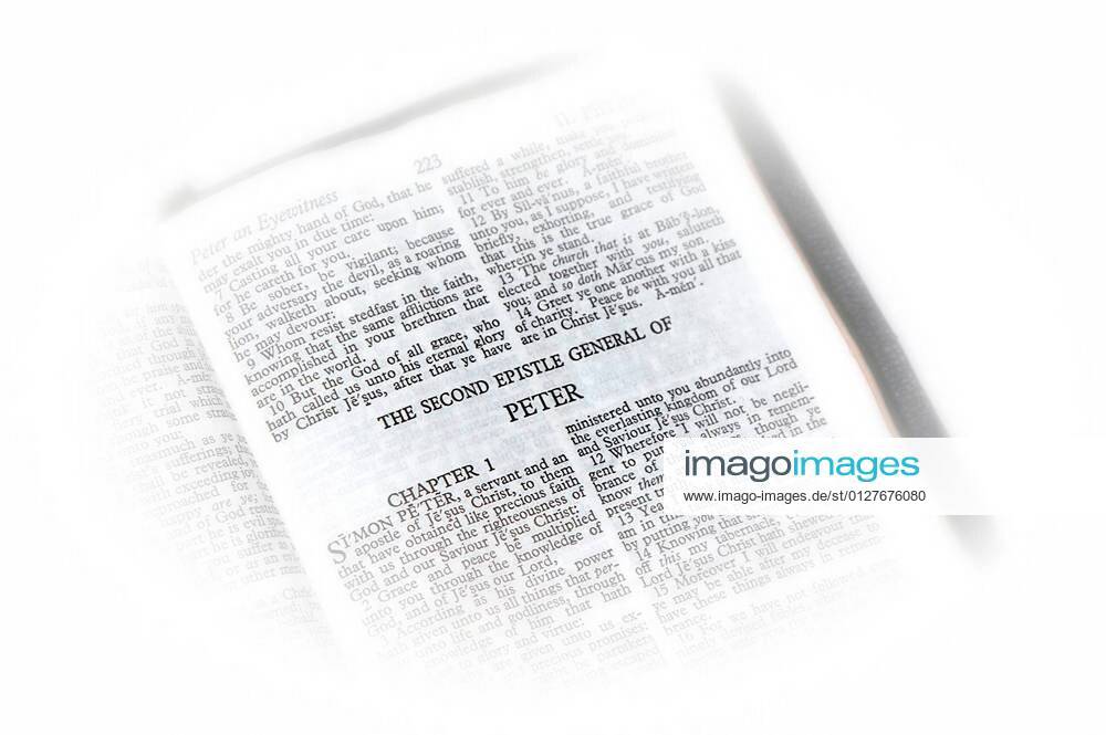 Holy bible open to the second epistle of james, with white