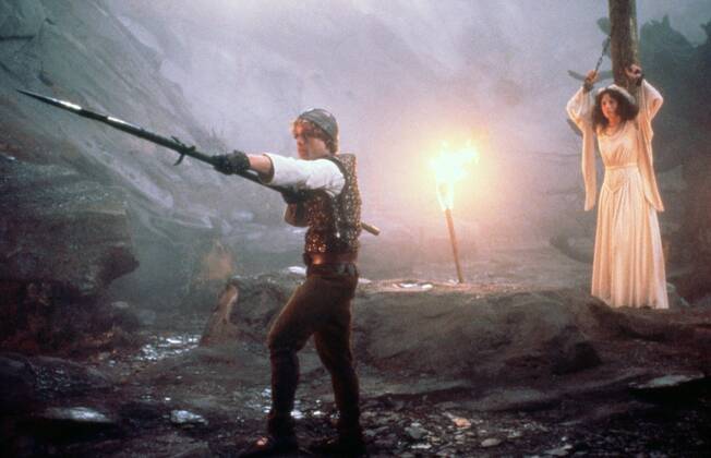 DRAGONSLAYER, from left: Peter MacNicol, Caitlin Clarke, 1981. ph ...