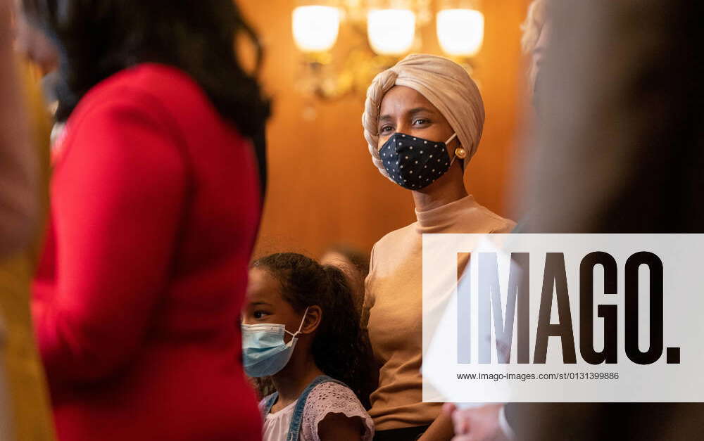 U.S. Rep. Ilhan Omar D-MN and her daughter Ilwad Hirsi listen as fellow ...