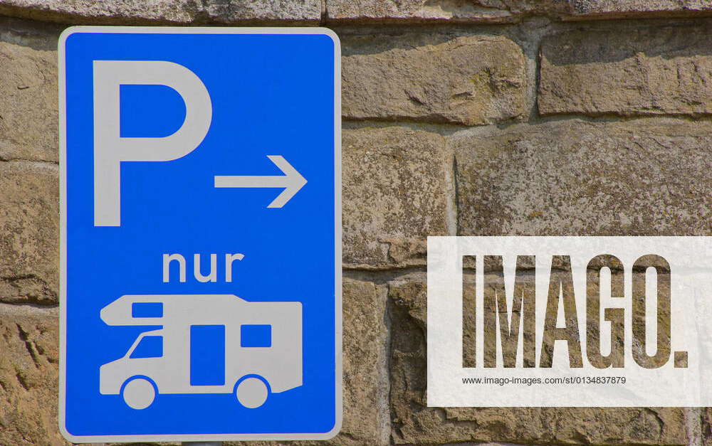 parking lot,trailer park,parking sign,motorhome pitch spot,car park,car