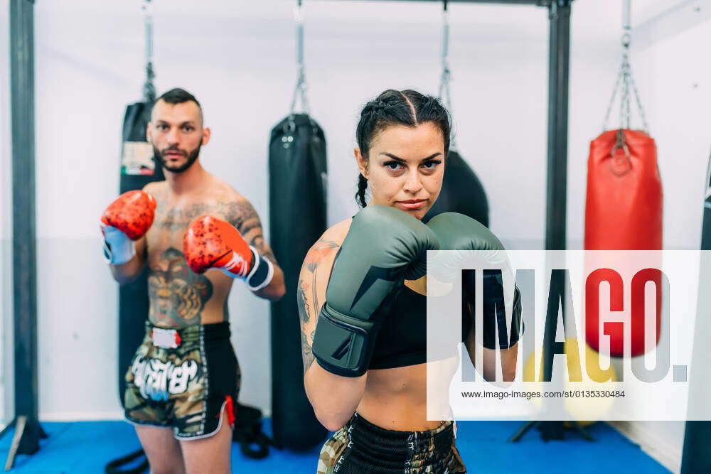 Portrait Of Male And Female Boxers