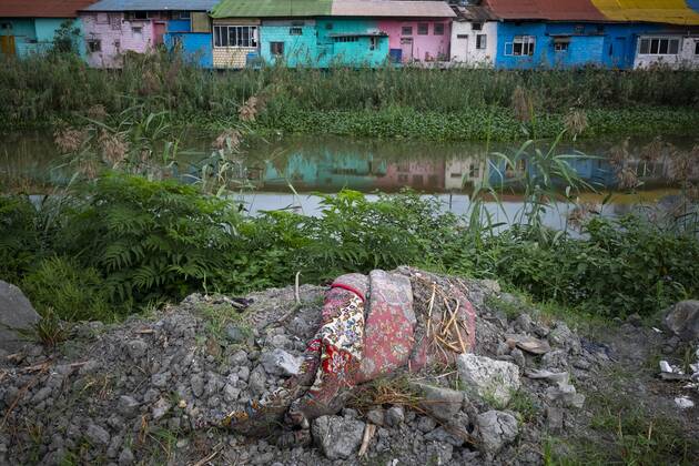 Fisherman s Colorful Bazaar Of Anzali An Iranian fisherman walks in the ...