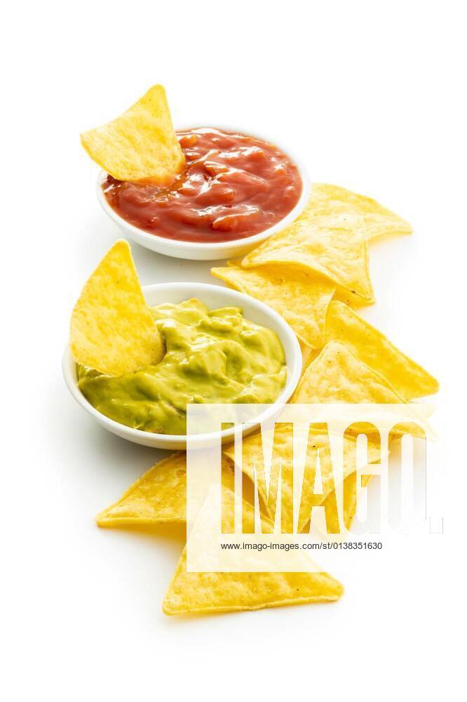 Corn nacho chips with avocado and tomato dip