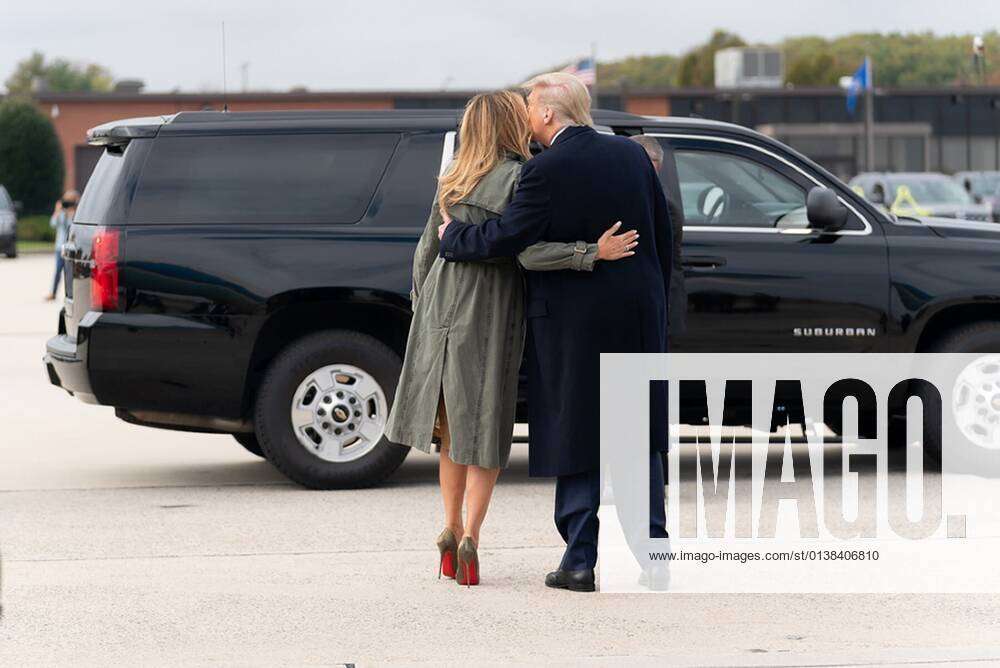 President Donald Trump And First Lady Melania Trump Embrace As He