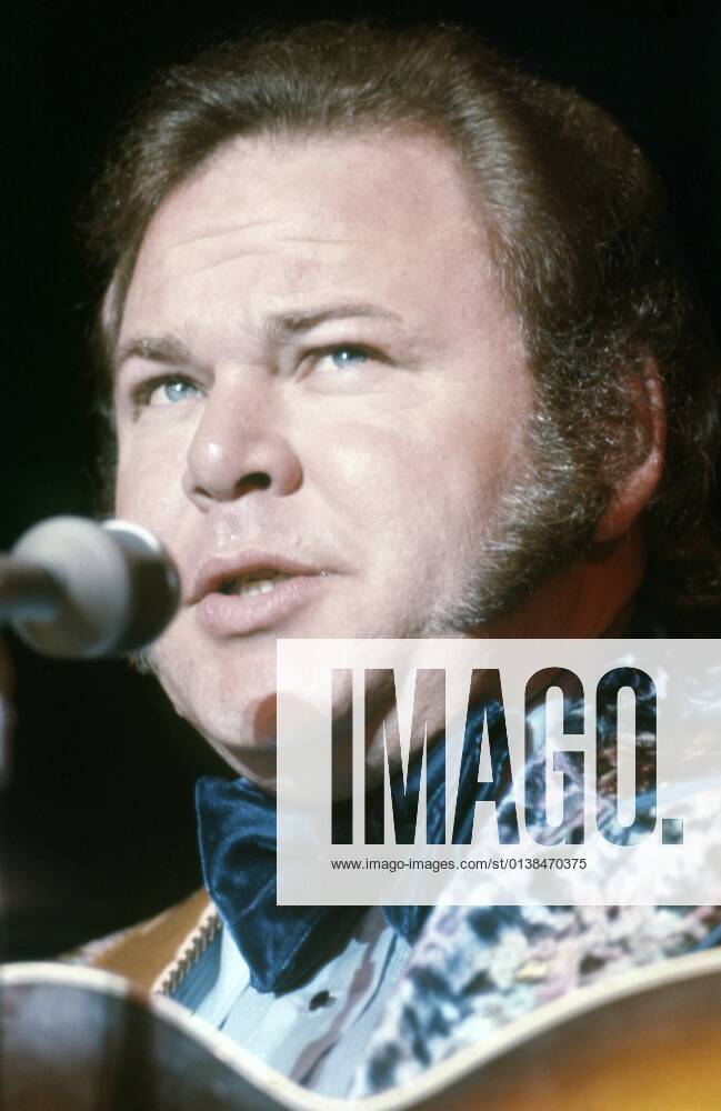 Roy Clark, performing at the Frontier Hotel, Las Vegas, NV, 1973. ph