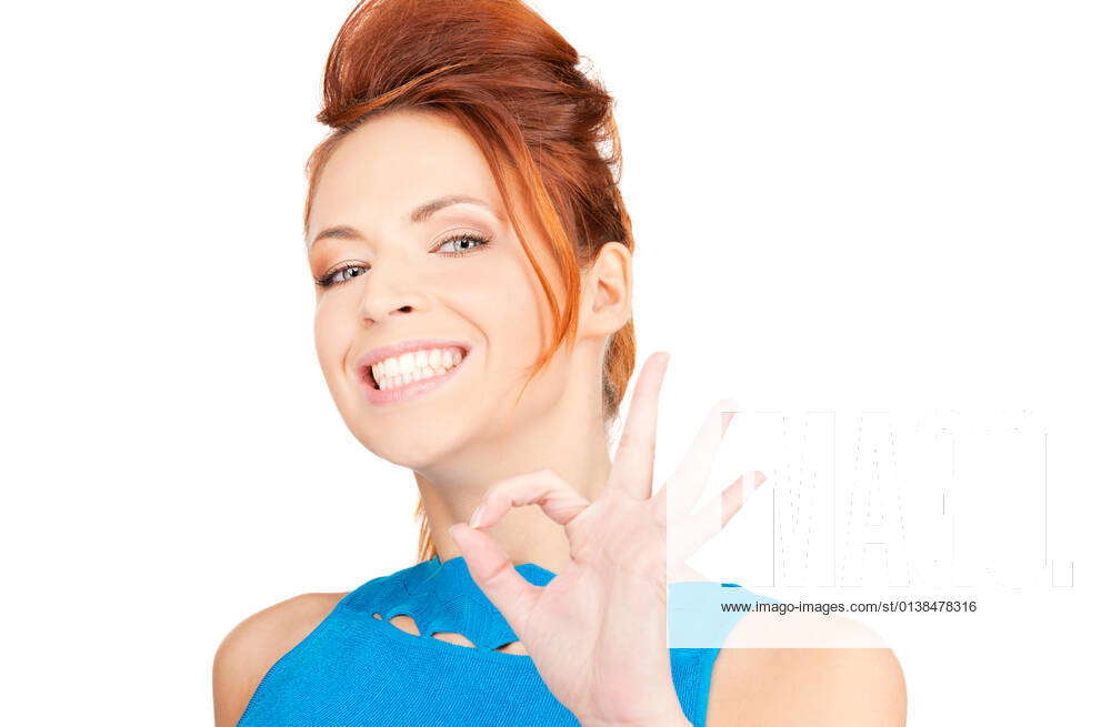 Bright Picture Of Lovely Redhead Showing Ok Sign Copyright 7848