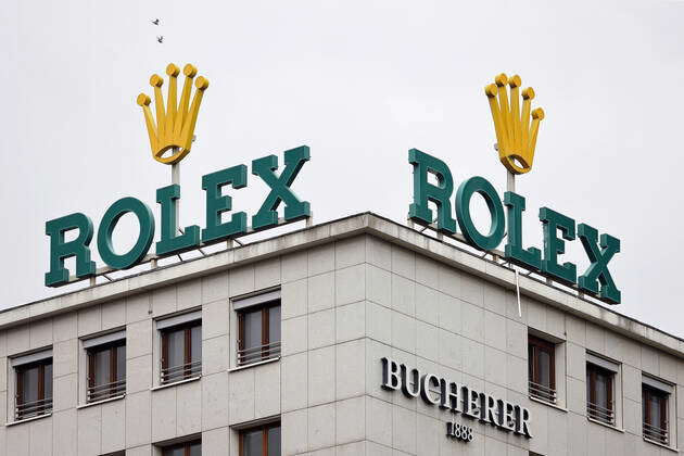 The logo of the watch manufacturer Rolex emblazoned on a roof