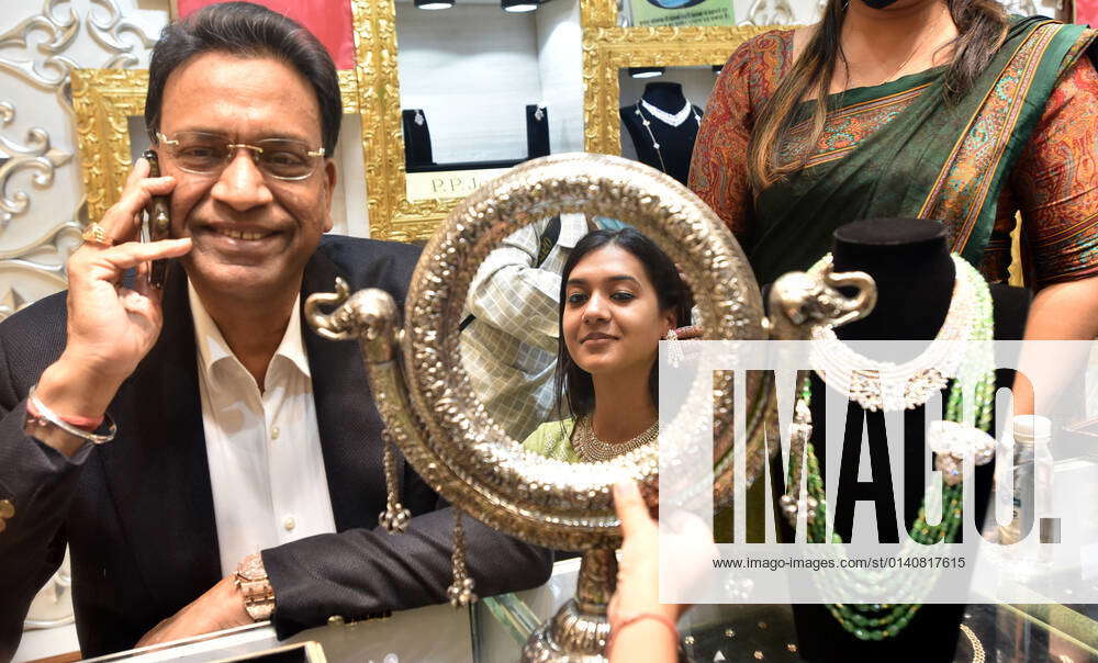 NEW DELHI, INDIA - NOVEMBER 2: Women purchasing gold Jewellery at PP 