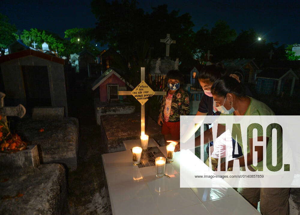 Day Of The Dead In Playa Del Carmen People visit family graves in the ...