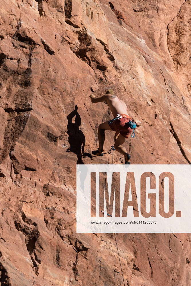A sport climber on lead falls off the wall called the Theater near Moab ...