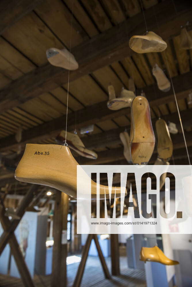 Shoes hanging from ceiling in Fagus Factory, Lower Saxony, Germany