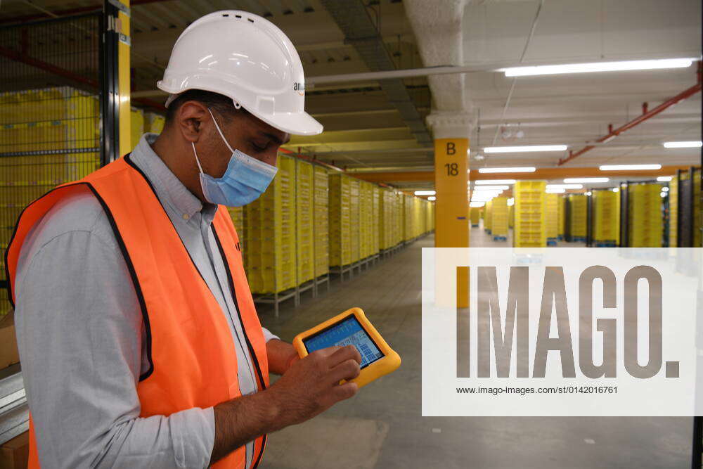 AMAZON AUSTRALIA ROBOT TOUR, Amazons Robotics Deployment Engineer Manager Perry Deu during a tour