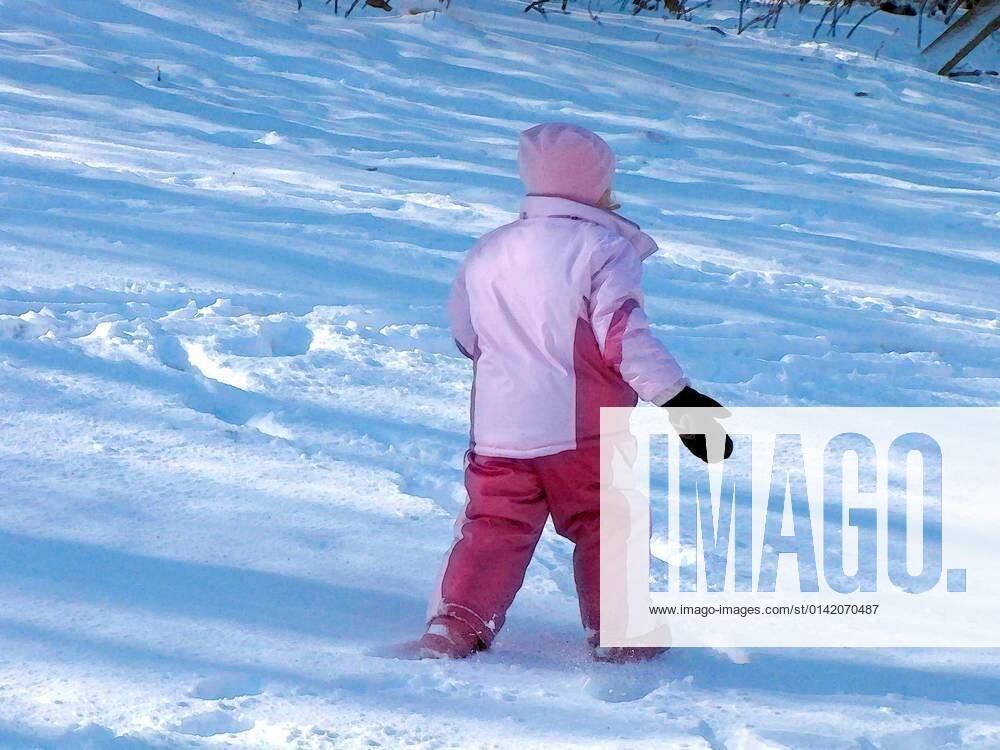 Little Girl In Pink Snowsuit xFotosearchxLBRFx xCSP_darla1949x