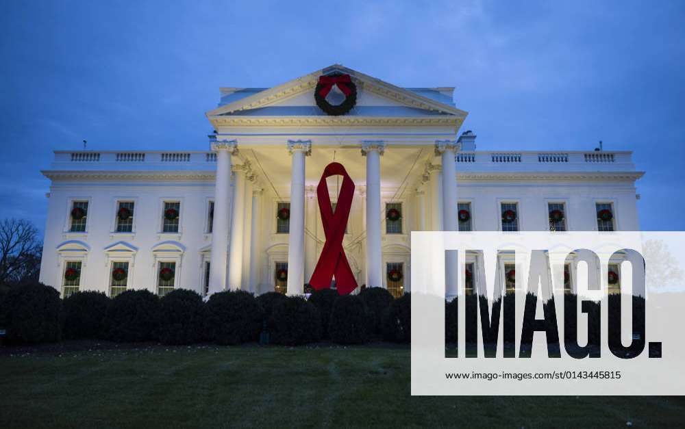 White House hangs red ribbon for World AIDS Day - CBS News