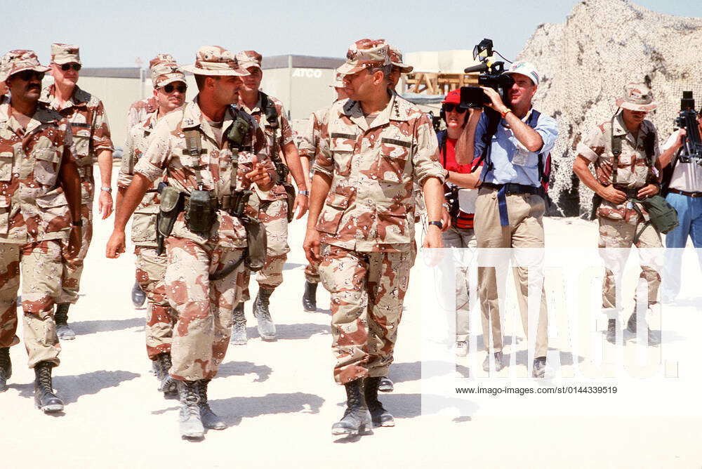 Media camermen film General Colin Powell, chairman of the Joint Chiefs ...