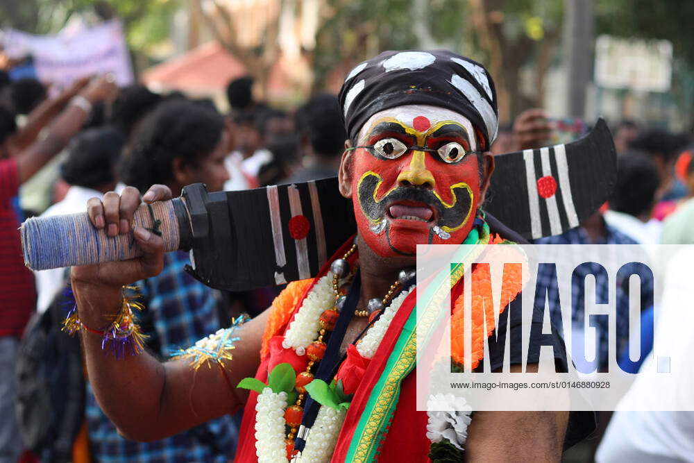 January 3, 2022, Chennai, Tamil Nadu, India A traditional folk artist poses for a picture during a