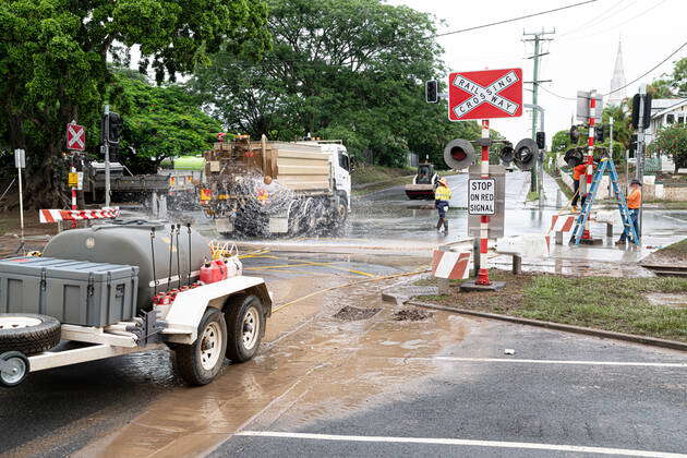 FLOODS QLD, Council workers clean up damage caused by floodwaters in ...