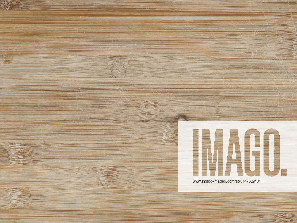 Scratched bamboo cutting board texture using as