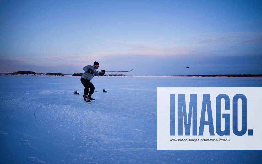 January 22, 2022, West River, PEI, CANADA Ryan Sanderson shoots the puck upice while playing a