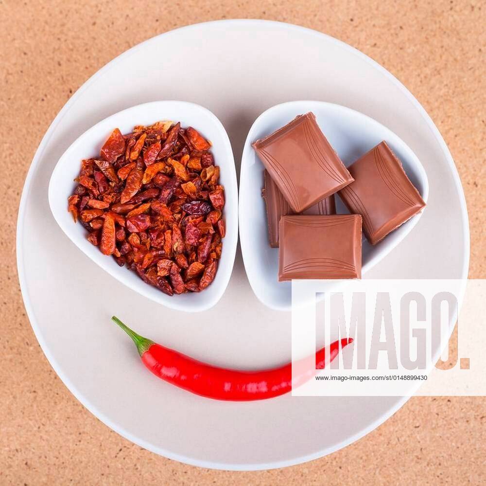 Chili peppers and chocolate xFotosearchxLBRFx xCSP_JanMikax