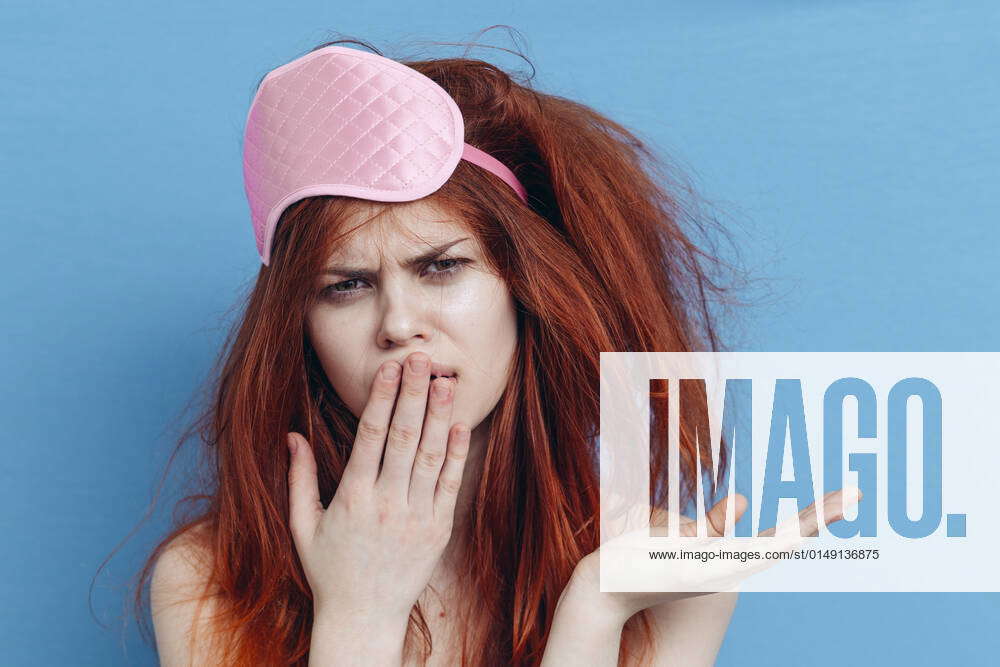 woman with tousled hair sleep mask posing closeup woman with tousled