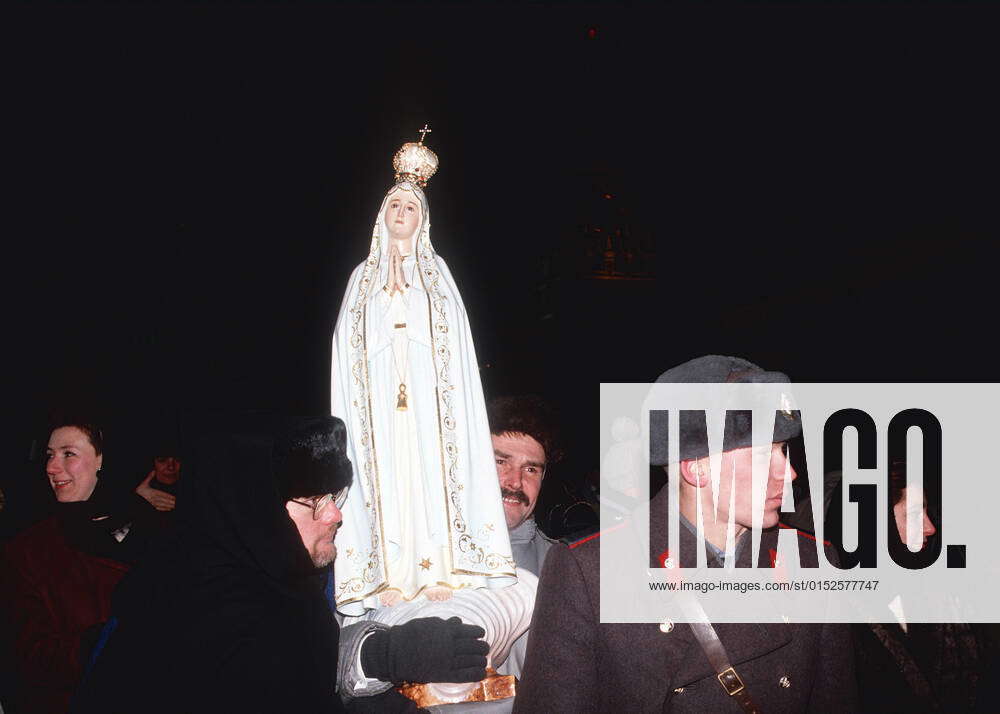 Red Square. New Year s. American Franciscan fathers with a statue of ...