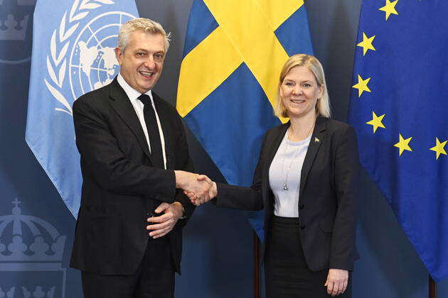 United Nations High Commissioner for Refugees Filippo Grandi exchanges ...