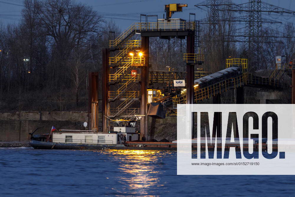 Loading of a bulk carrier with coke at the southern port of Walsum of ...