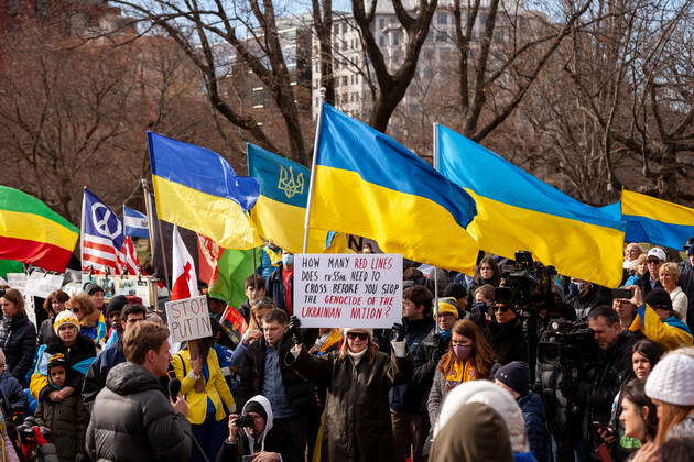 Vigil at the White House for people killed in Ukraine A Ukranian flag ...