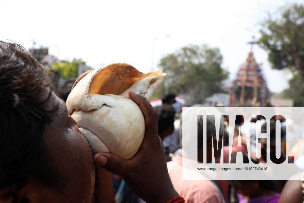 March 15, 2022, Chennai, Tamil Nadu, India Hindu devotees blow horns