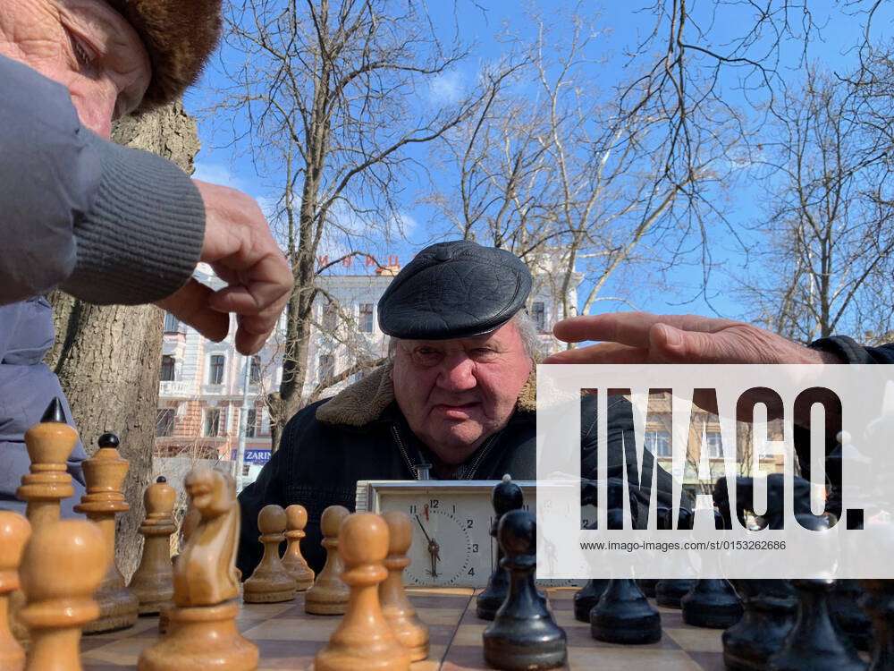 Odessa, Ukraine. 31st Mar, 2022. Elderly men play chess at the