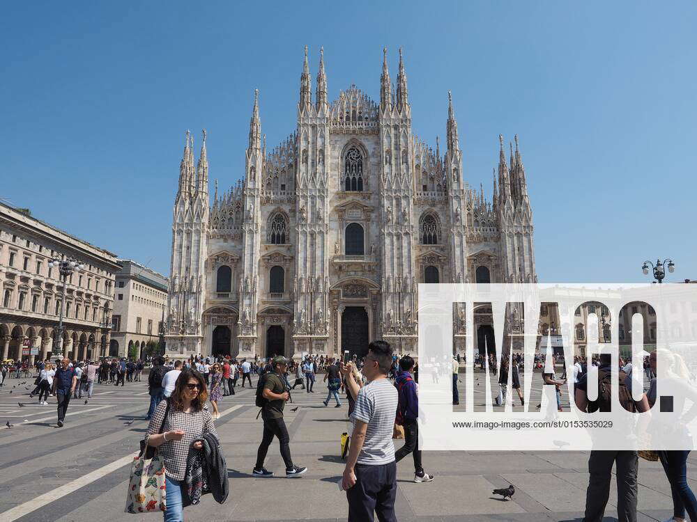 MILAN, ITALY CIRCA APRIL 2018 People in Piazza Duomo in front of