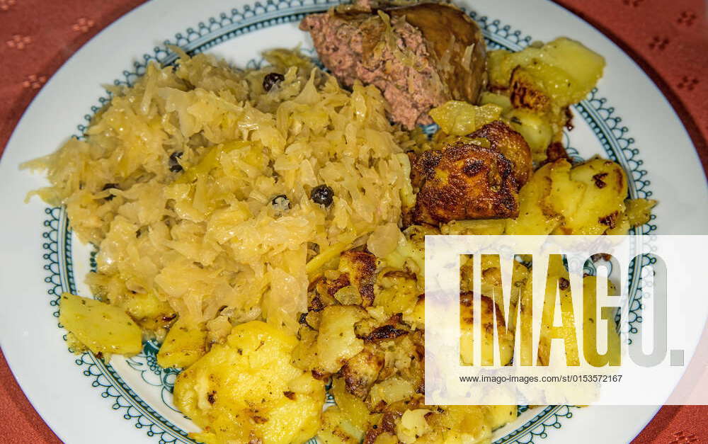 German deli Sauerkraut with liver sausage and roasted potatoes, model