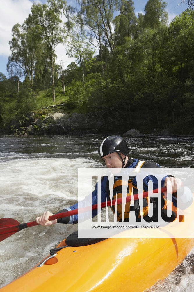 Man kayaking in river, model released, 10022304, 20s, Action, Activity ...