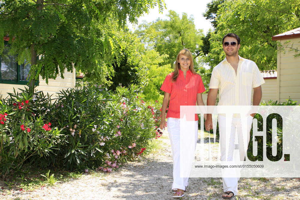 Happy couple on summer vacation at campsite in Rome, Italy, Europe