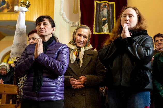 April 24, 2022, Nadyby, Ukraine: Ukrainian faithful pray during the ...