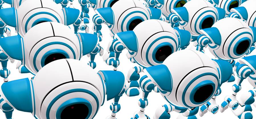 A crowd of robots standing obediently in rows. Perhaps they have just ...
