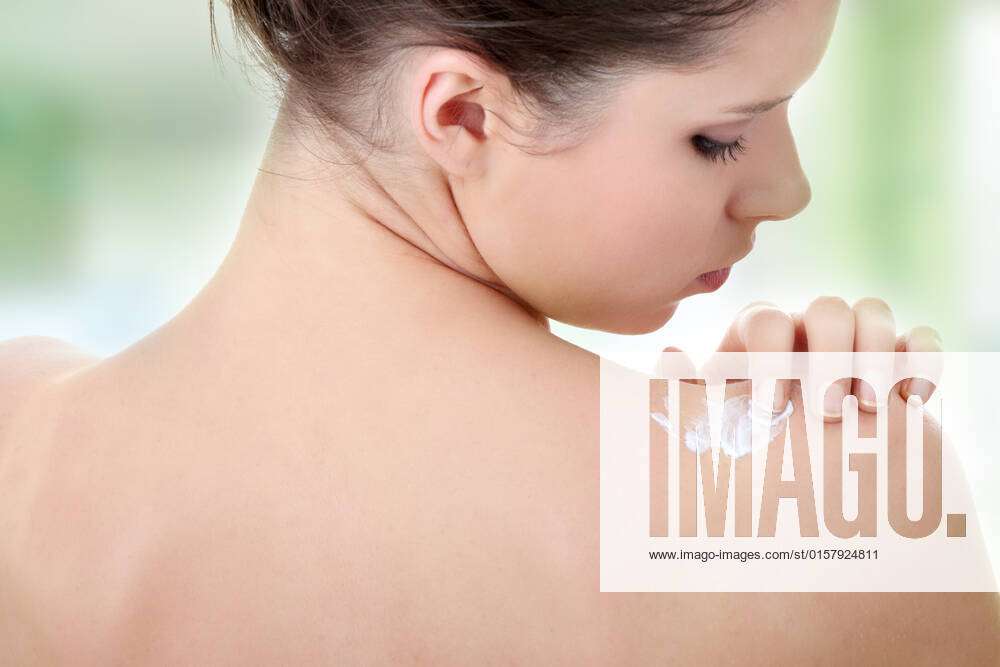 Skincare Concept: Back Of Beautiful Woman With Soft Skin Putting Skincare  Product (cream) On Her Back Stock Photo, Picture and Royalty Free Image.  Image 5362013.