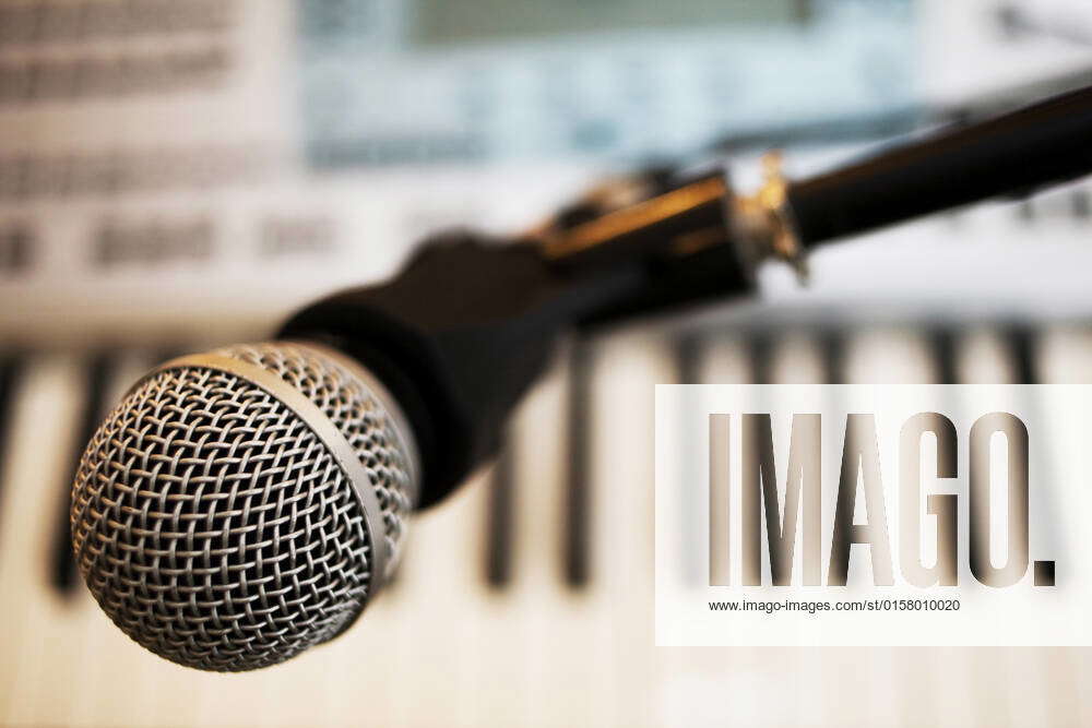 stock-photo-an-image-of-a-microphone-and-a-keyboard-2784627-jpg-microphone-big-keyboard-key